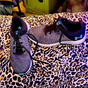Mint condition women's under armour, tennis shoes. Worn twice.